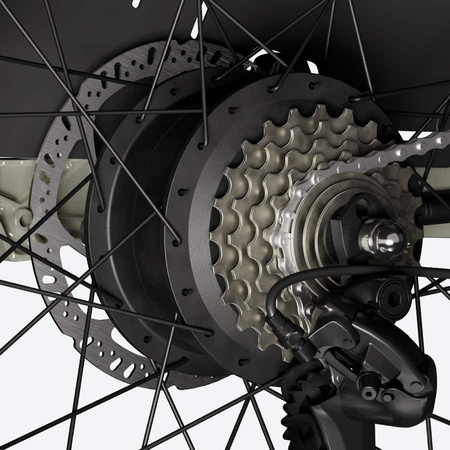 A close up of a bicycle wheel with a shimano rear derailleur